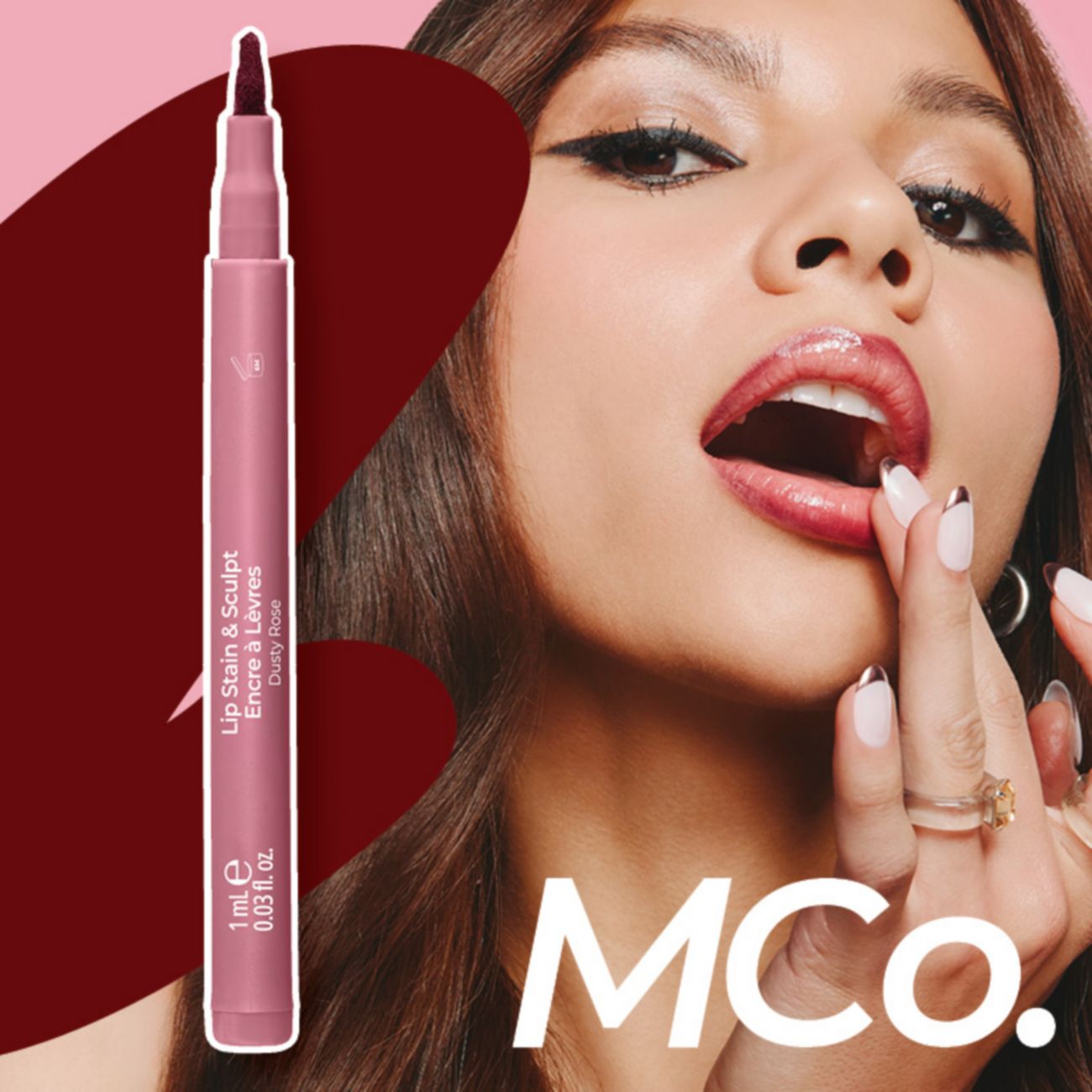 Lip stain & Scuplt. Mco. Woman apply lip stain.