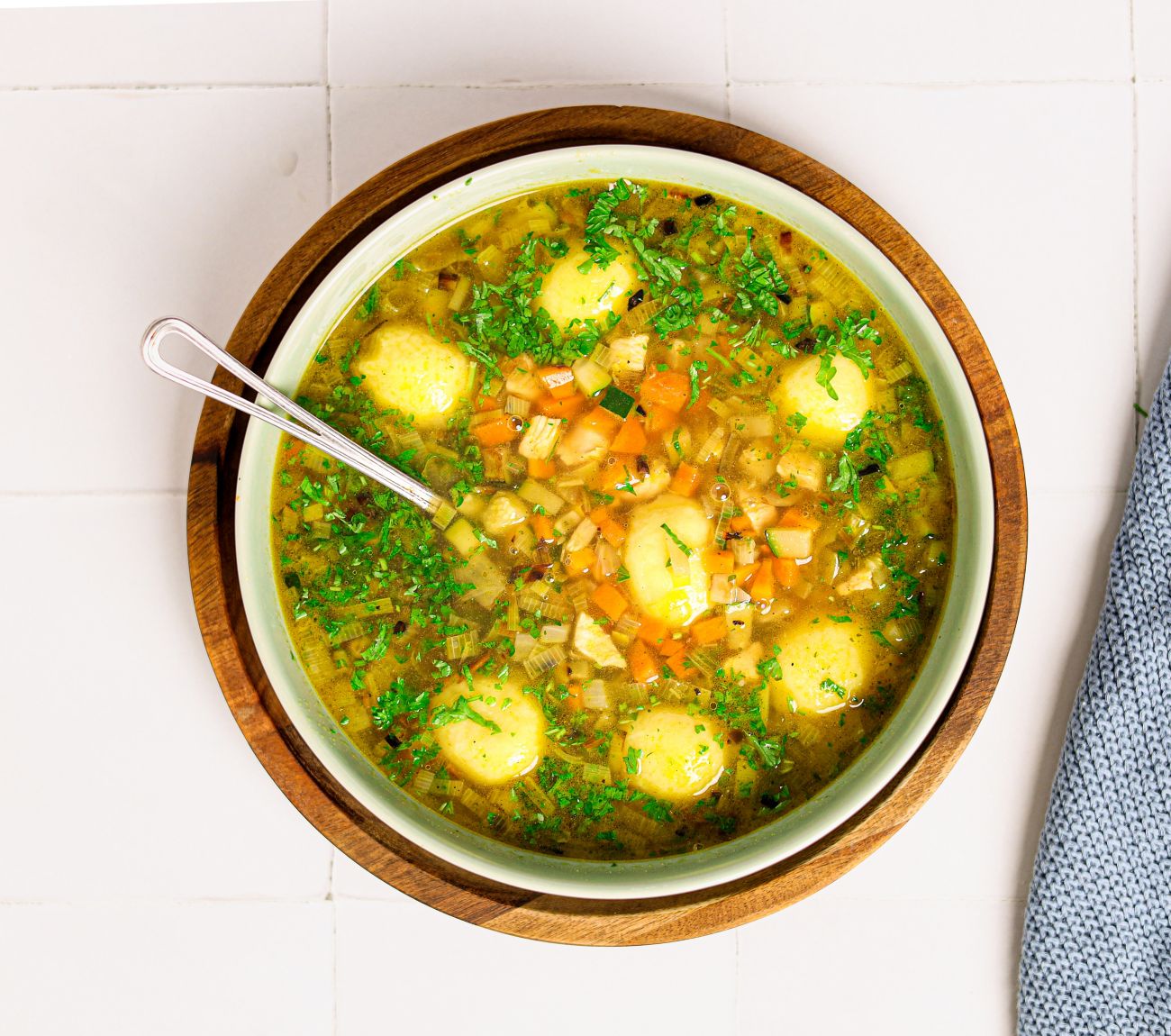 https://foodhub.scene7.com/is/image/woolworthsltdprod/kosher-matzo-ball-chicken-soup:Mobile-1300x1150