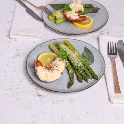 Lobster Tail with Hollandaise & Parmesan Roasted Asparagus.