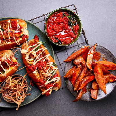 Nandos Chilli dogs with crispy onions and spicy sweet potato wedges