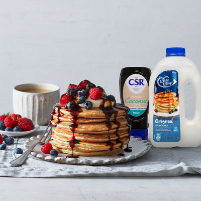 Fluffy Shrove Tuesday Pancakes with Berries and Coconut Syrup