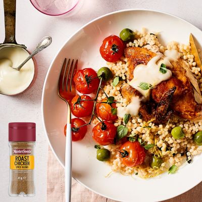 Roast chicken with blistered tomatoes and fragrant pearl couscous 
