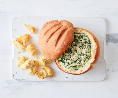 Spinach dip in cob loaf